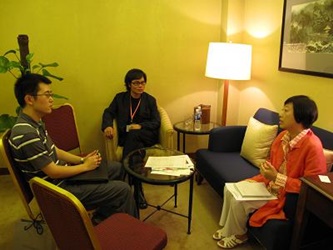 Director Percy Chan discusses his project with Beijing film investors