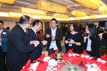 Guests chat enthusiastically at the Networking Luncheon