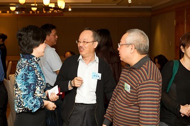 Hong Kong New Action Producer Mr. Titus Ho (centre) talks with guests at the Luncheon