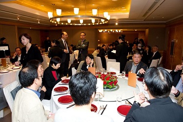 Guests chat enthusiastically at the Luncheon