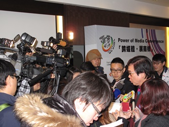 Mr. Raymond Wong, Member of FDC, is interviewed by the media at the Media Briefing