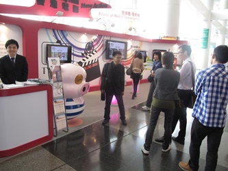 Hong Kong Film New Action Booth draws a lot of attention from visitors, who take pictures in front of the Booth