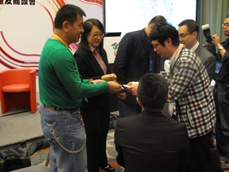 Hong Kong New Action Director Jamie Luk (left) exchanges views with participants after a panel discussion