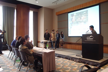 Workshop participants rehearse for the film project pitching session