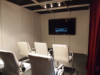 The exhibition booth is equipped with a screening room for preview purpose