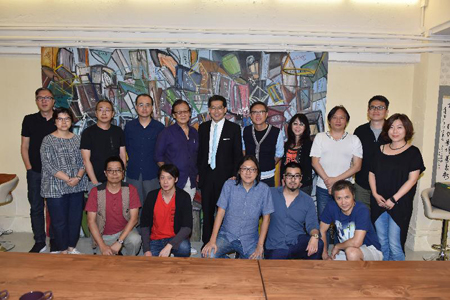 Mr So (back row, centre) in a group photo with the President and Executive Committee members of the Hong Kong Film Directors' Guild after the meeting.